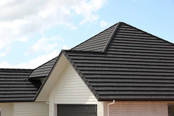 Durable dark residential roof on a Wellington home